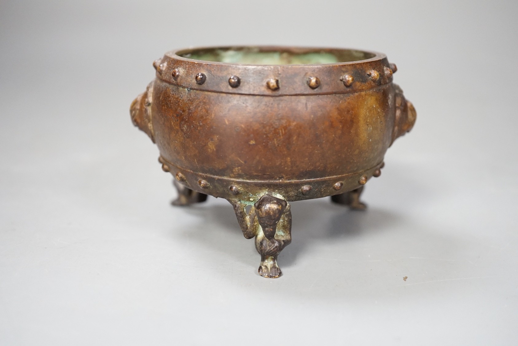 A Chinese bronze tripod censer, Xuande mark - 7cm tall